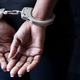 Handcuffed Black woman